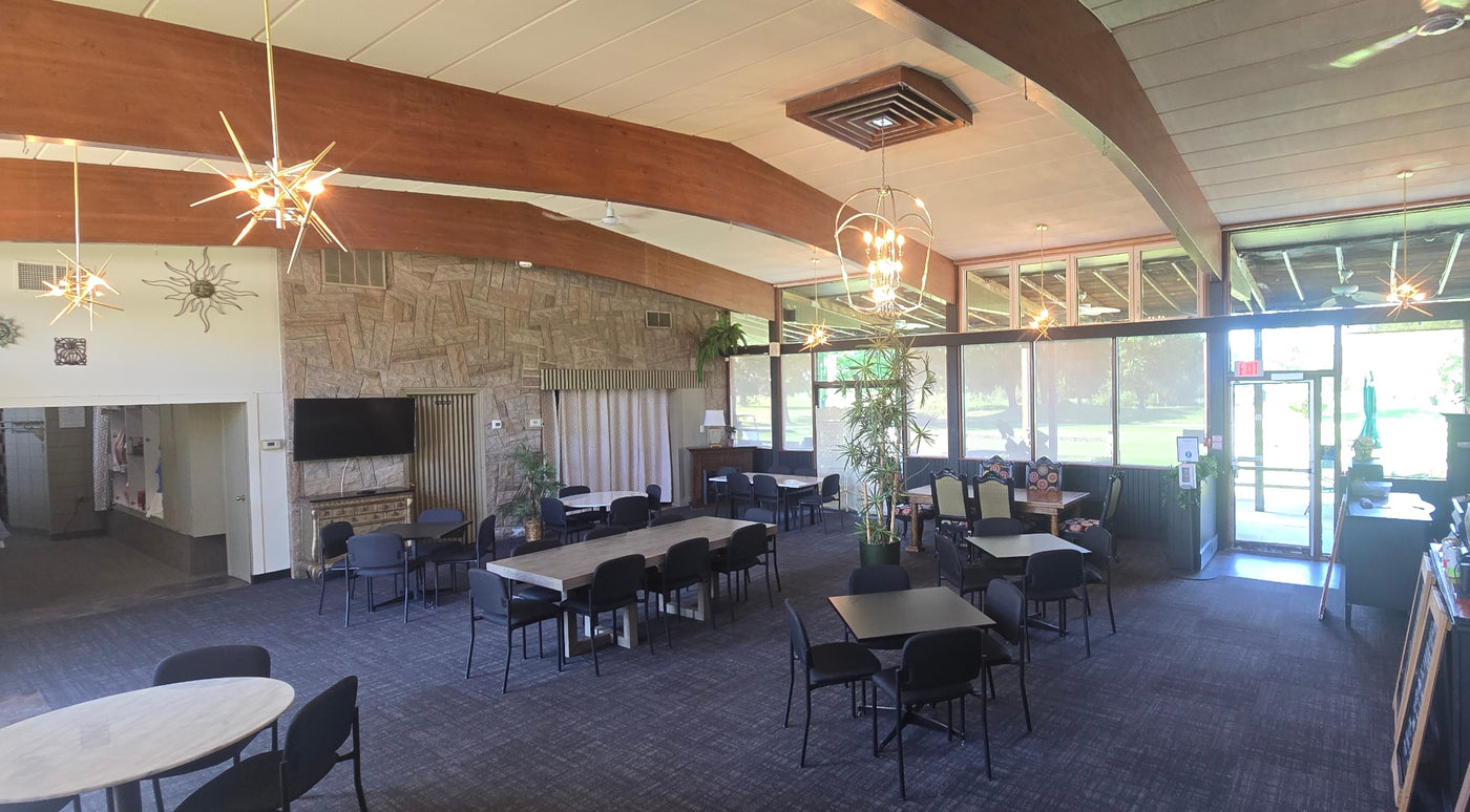 The Southern Pines clubhouse dining room set for a group